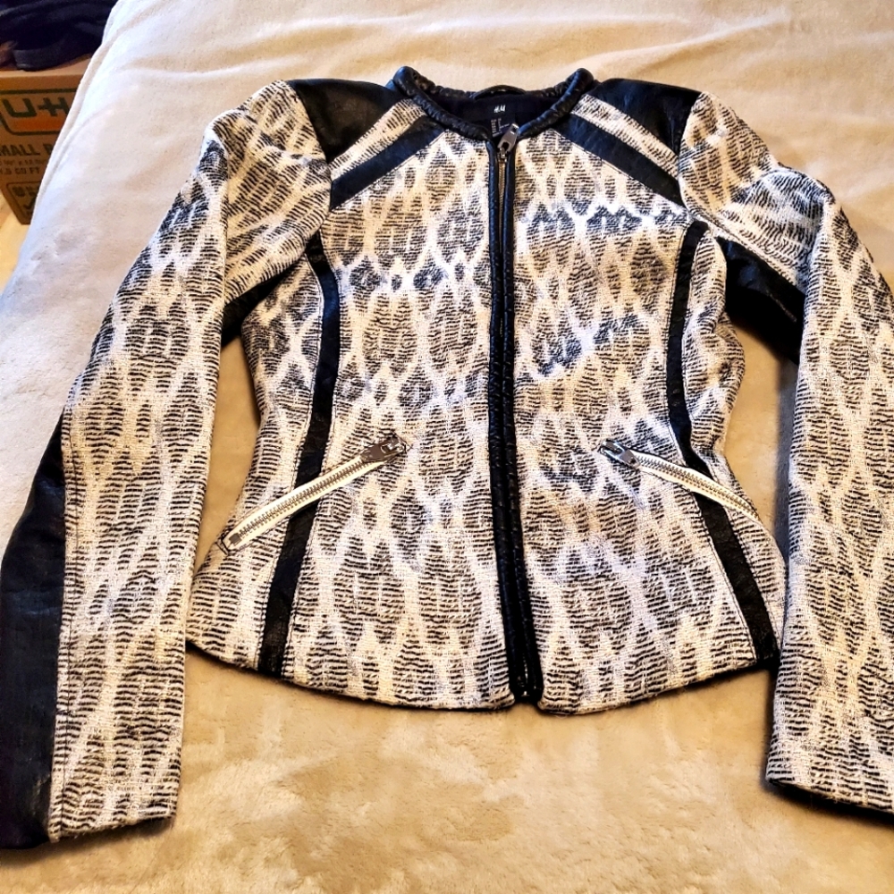 H & M Jaquard print and faux leather lined jacket.